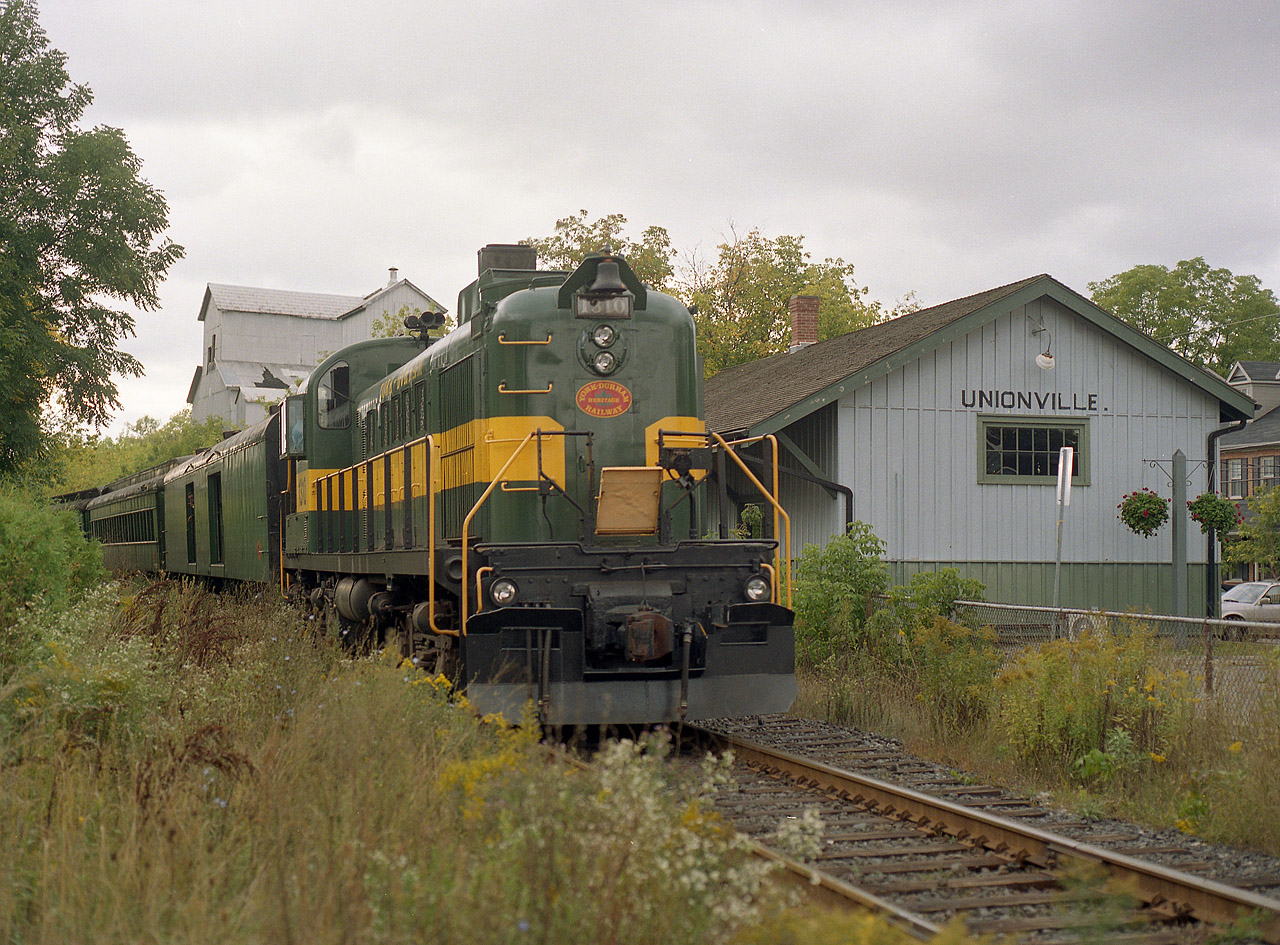 York-Durham Heritage Railway RS-3 #1310 is seen as tail end unit on a special Unionville Fall Fair train, part of the town Festival that draws large crowds from all over. This former CN trackage is now under ownership of GO Transit. The 1310 once toiled on the ONR and then the x-Abitibi at Iroquois Falls, and now enjoys semi-retirement on the relatively quiet YDRC, based out of Uxbridge.