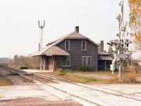If one was to drive up 35th Line north off of old Hwy 2, just west of the Lafarge plant; cross the tracks and pull into the short drive on the left, remnants of an old station can be seen. Not much, just some rusted scrap, a pole, and the row of bushes. This rather important structure stood where the CP line came down from St. Mary's, joined the Galt sub running eastward for a 100 feet or so and then branching off in front of the Zorra Station and continued down into Ingersoll and onward to Port Burwell. The Zorra to Ingersoll track has been gone for many years; until 15 years or so ago just the spur into what was St. Mary's Cement remained. As well, all but a half mile off the Galt toward St. Mary's has been removed. The last train over the St. Marys length ran in 1995. I am not sure what year the Zorra station was removed, perhaps around 1981, but it was leveled suddenly and without fanfare. Rumour has it that a hole was dug and the station was demolished and buried on the site. A real shame. I found it a very attractive building, despite most of the time being shrouded in dust from the nearby cement industries.