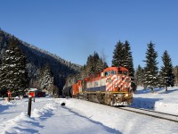 Bruderheim, AB - Tacoma, WA crude oil loads climb west on CN's Albreda Sub between Canoe River and Albreda passing the Summit River Lodge.