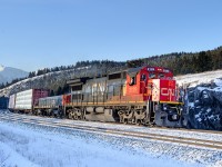 The light wasn't quite right for this guy, but I figured it would be silly not to shoot this lashup! CN C40-8 2129 and CN GP9 Slug 252 have just departed English with Prince George-Winnipeg (this train normally terminates at Edmonton, but presumably due to the cold weather, they ran it straight through to Winnipeg) train M348. Operating mid-train was IC SD70 1001, making for an odd looking headend consist!