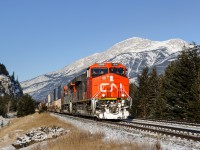 Still looking quite new, CN ET44AC 3098 leads train Q111 towards a crew change in Jasper.