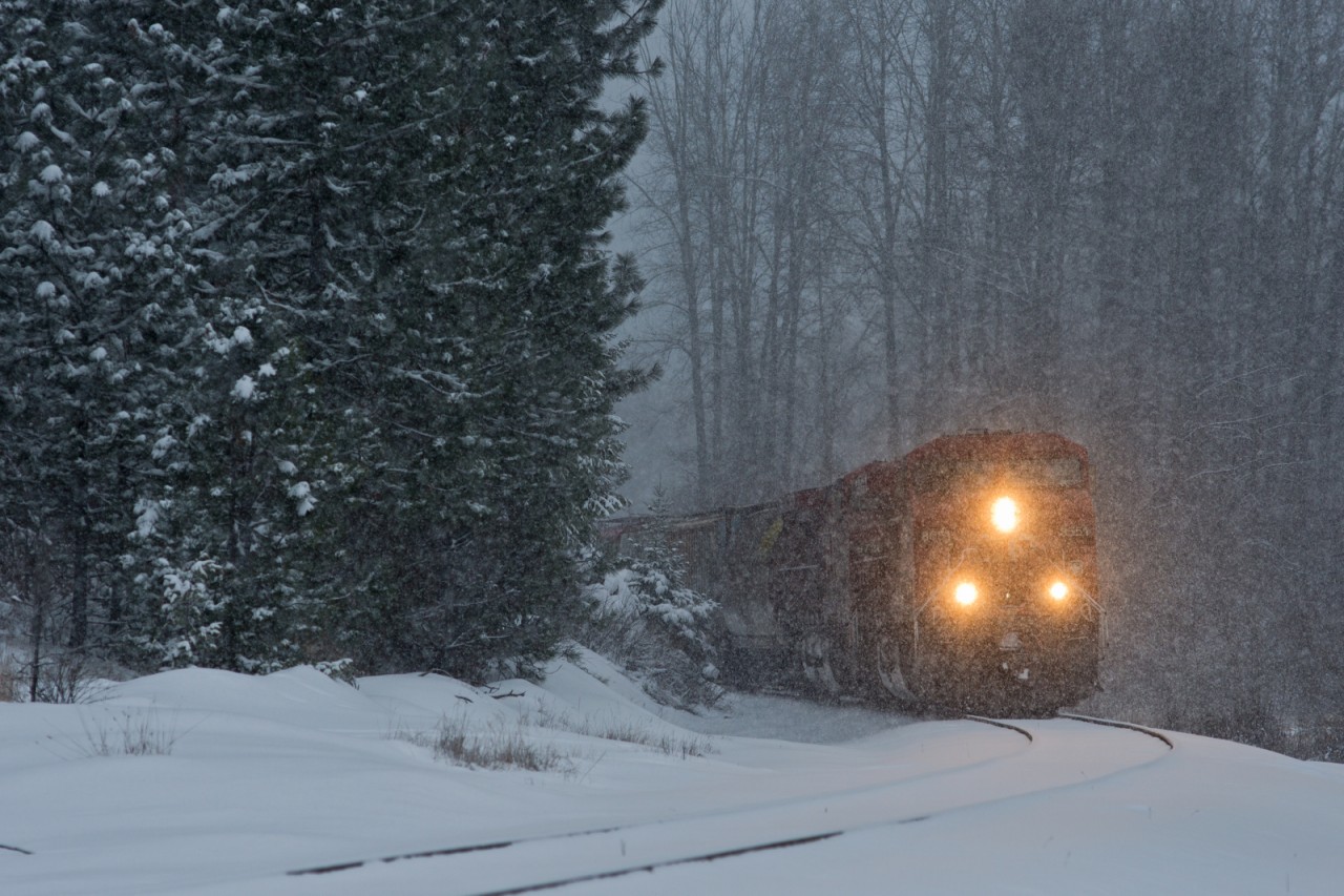 A pair of AC4400's lead a westbound mixed fright into Yahk to wait for some congestion at the US border to clear up.