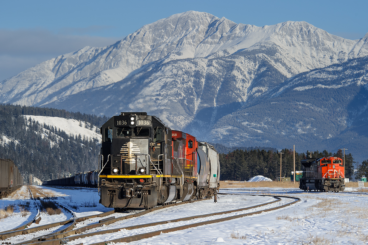 After giving the power a spin on the wye at Jasper, Edmonton-Prince George train M303 prepares for departure behind IC SD70 1036.