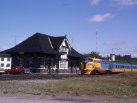 It is a nice sunny Thursday morning as the southbound ONR 1986 makes a station stop at the recently refurbished and historic Temagami station. This northland passenger train would be scuttled by an uncaring and unconcerned liberal government on 09/28/2012.