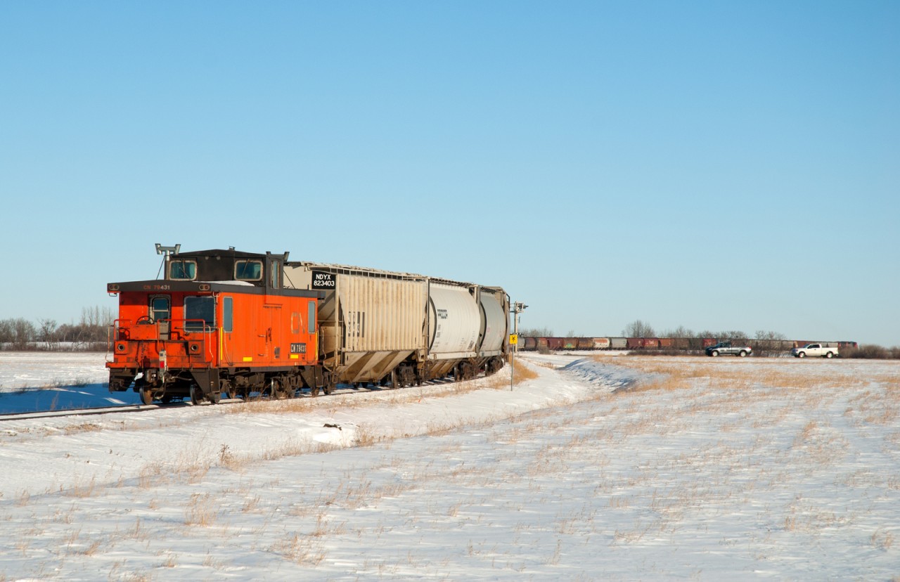 CN Point St Charles Van #79431 has just left the Watrous Sub main line and is now on the 3.2 mile Cargill spur near Clavet Saskatchewan.