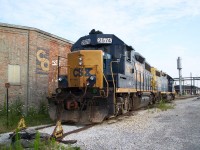 The work day is over for the crews on the CSX "Canadian" district. Here we find a pair of the regularly assigned GP38-2's #2574 and #2579 resting beside the engine shop at Sarnia, Ontario. 