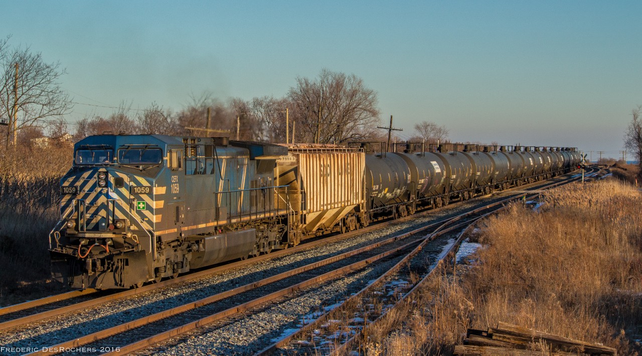 With CP 8950 in the lead, CEFX 1059 pushes hard at the rear of 650 through Lovekin. (1602hrs)