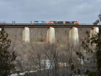 After being lifted in Sarnia from L50462, CN M384 gives GTW 5936 a ride to Mac yard for inspection as it crosses the Credit River