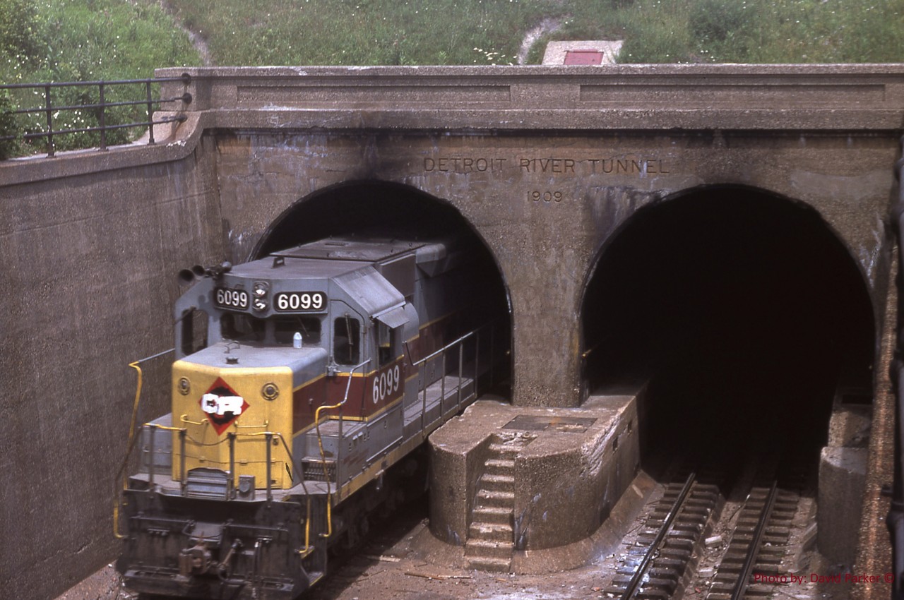 CR 6099 (Ex EL) SD45 ducks back into the Detroit River Tunnel returning "lite engines" back to Detroit