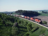 2 SD40's and 2 MLW's lead CP train #902 through the rolling hills around Bolton on May 28, 1978.