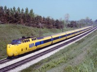 VIA used the higher speed Turbos for a few trains a day between Montreal and Toronto in 1978.  Here we see a westbound almost at the end of it's trip near the Rouge River crossing west of Pickering.  It was a fun ride to snag a seat in the bubble and watch the speedometer push toward 100 mph for the just over 4 hour trip.   