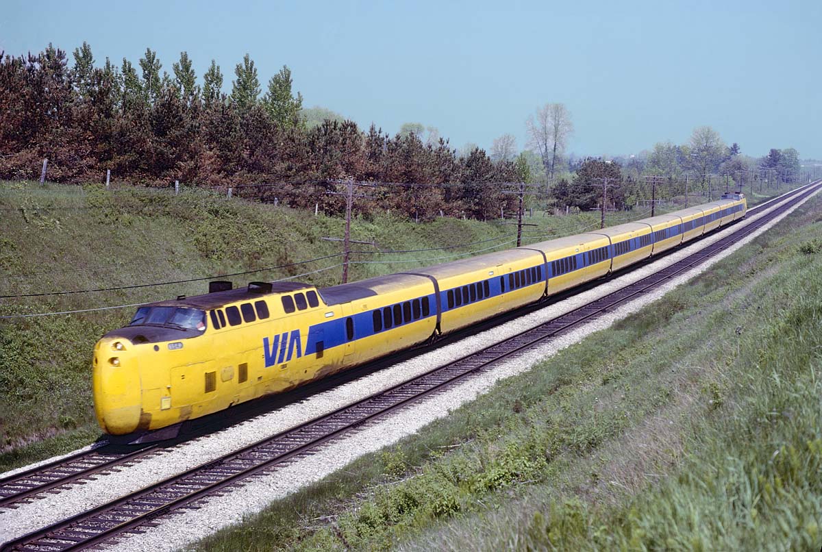 VIA used the higher speed Turbos for a few trains a day between Montreal and Toronto in 1978.  Here we see a westbound almost at the end of it's trip near the Rouge River crossing west of Pickering.  It was a fun ride to snag a seat in the bubble and watch the speedometer push toward 100 mph for the just over 4 hour trip.