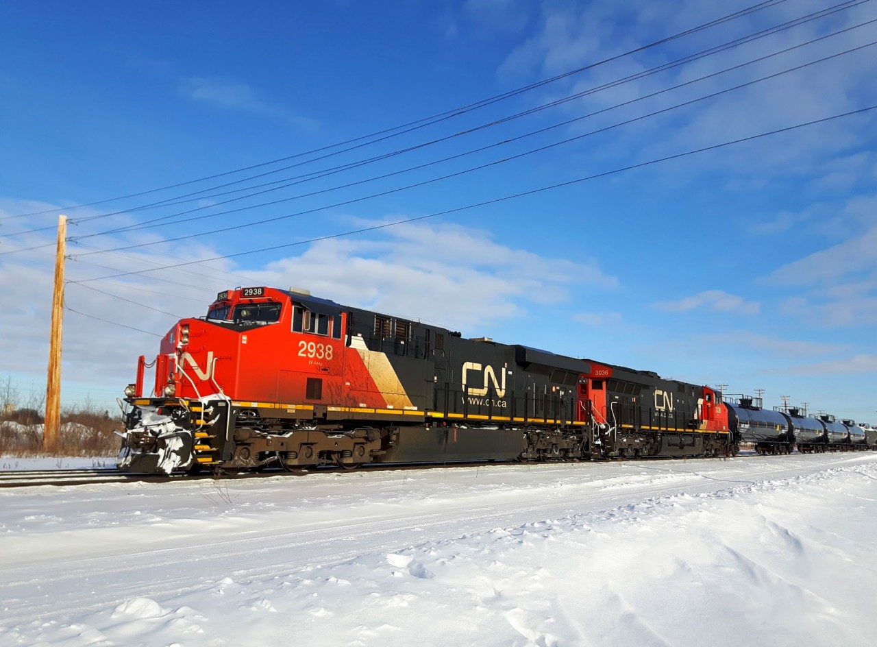 CN 2938 leads a train out of Winnipeg.