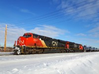CN 2938 leads a train out of Winnipeg.
