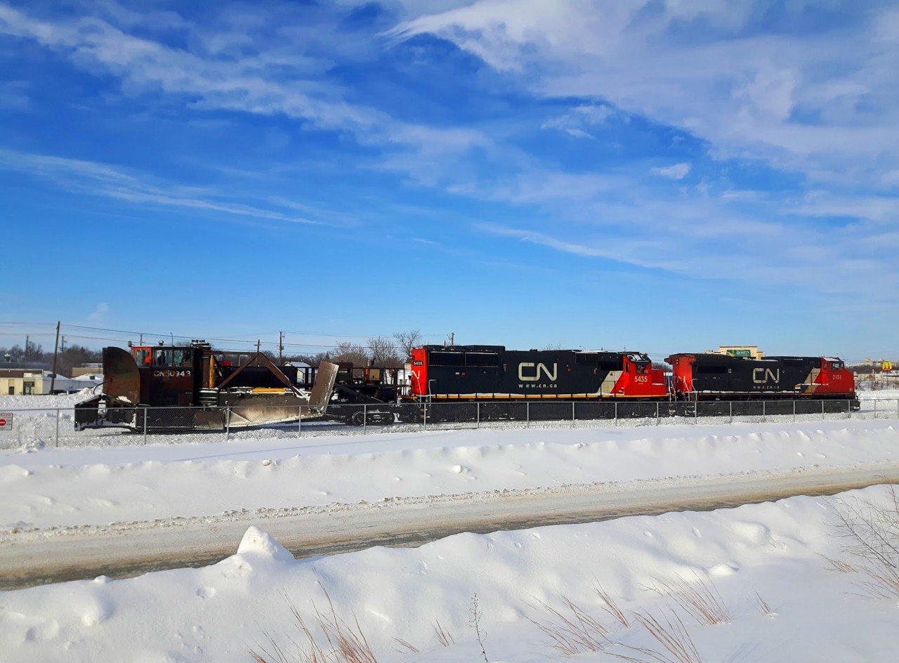 A very rare sight as CN 2181 and CN 5435 plow Fort Rouge Yard with plow/spreader CN 50943. This is my first time catching a spreader in action.