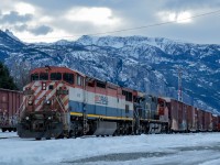 A recently arrived L546 sits in track four of Squamish Yard with old resident returning for a visit. 
4610 led 546 from North Vancouver to Squamish a few hours earlier, and upon arrival came into four and stopped. Now, 571 (Squamish-Prince George)'s crew has come to work and is starting to roll through the yard on 2861 to take charge of 546's power, switch, and lead north on the former BCR. <br> See my profile for the photo of 571 charging north. 