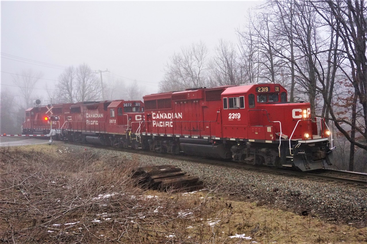 On a foggy day the trio of geeps run light power to Wolverton.