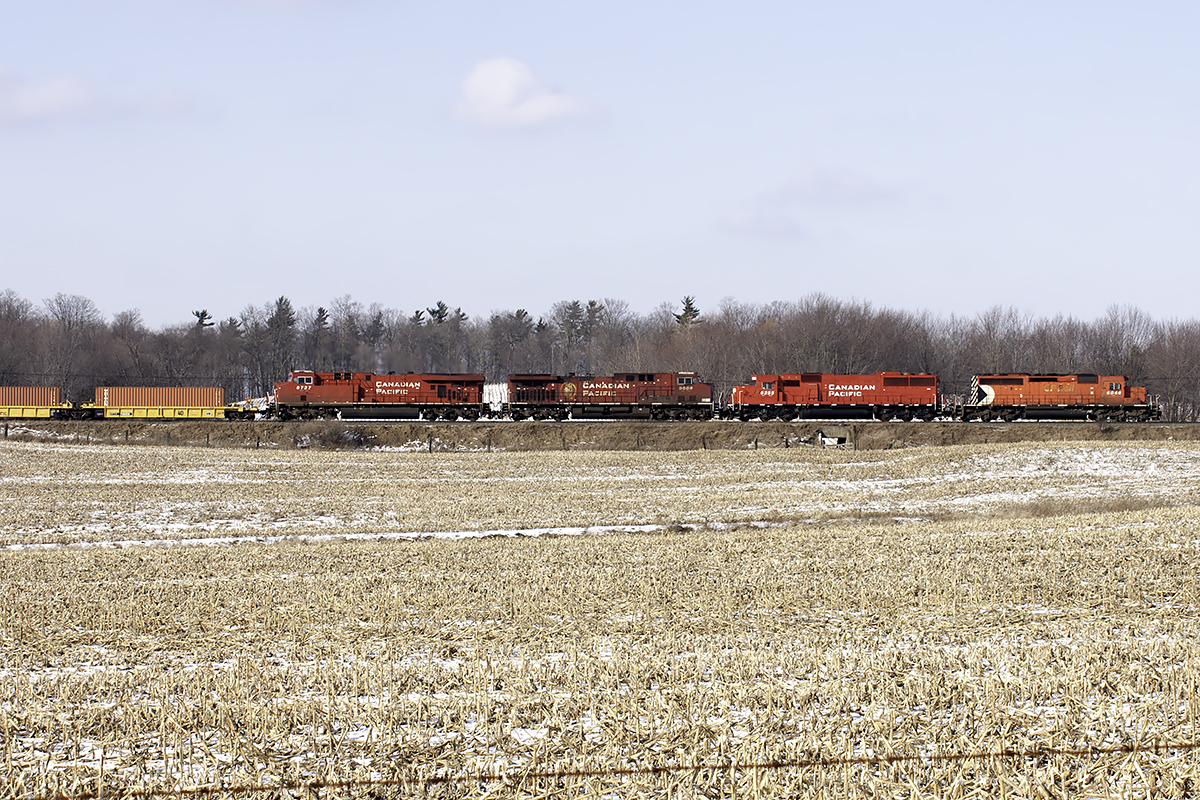 4 different units lead stacks east heading for the Junction. Half Multimark and all.