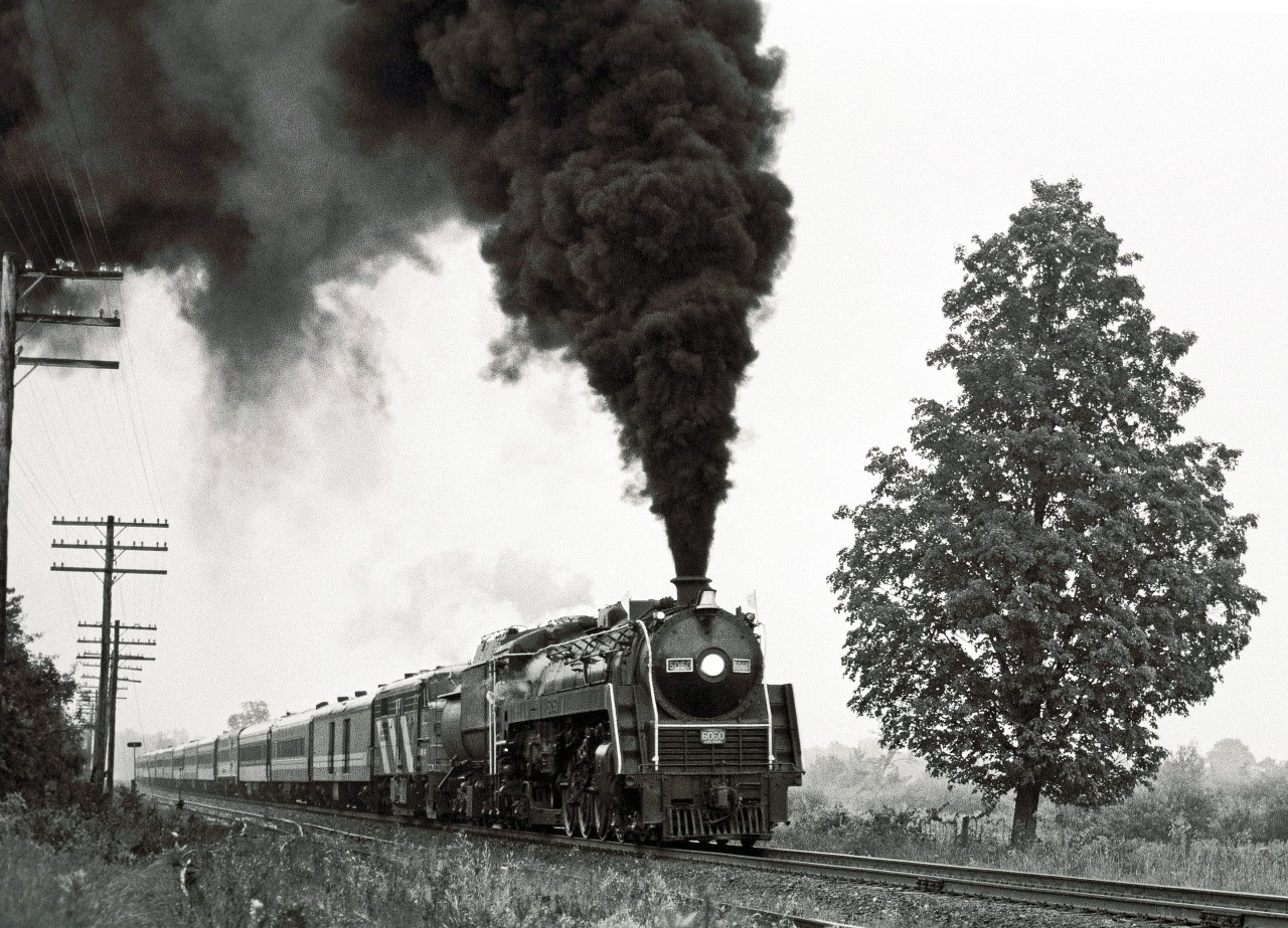 Anyone care for a little smoke?


The Mountain-type puts on an impressive runpast on her excursion from Toronto to Allandale in July, 1980.


In case you missed it, here's a photo taken that day at the Allandale Station...


http://www.railpictures.ca/?attachment_id=17841