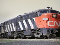 <b>IN YOUR FACE</B>MLW FPA-4 6762 with an MLW FPB-4 and a Geep are coming off the Dundas Sub at Bayview Jct in May 1968.  I just managed to catch the units as they filled the camera frame.  