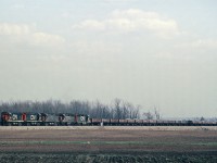 A trio of C-424's trailed by two GP-40's lead CN train 466 at Upper Middle Rd in Burlington, ON.  