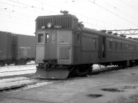 In the late 1950's, Canadian National used gas electric "doodlebugs" between London and Sarnia on occasion. Here we see CN 15836 at Sarnia station with a baggage car visible behind, under the overhead catenary wires for the St. Clair tunnel operation.