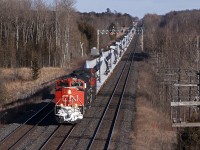 CN X307 rolls through the eastbound approach signals at Grafton. These windmill blades are destined for the great state of Texas.