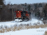 Running long hood forward CN 2548 provides the power for CN 908 as the haul the Jordan Spreader CN50948 back South at mile 216 of the Newmarket sub.