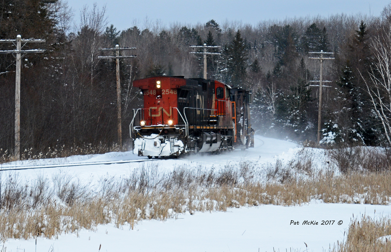 Running long hood forward CN 2548 provides the power for CN 908 as the haul the Jordan Spreader CN50948 back South at mile 216 of the Newmarket sub.