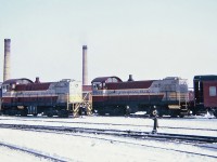 CP Alco S-2 No.7034 (1945), and MLW S-2 No.7086 (1949) switching passenger cars at CP's Glen yard, Montreal January 30, 1965.