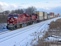 Lightly frosted CP 8858 leads 8505 and 113's train past the siding at Lovekin (8538 is the DP today). Thank you tie pile. 1421hrs.