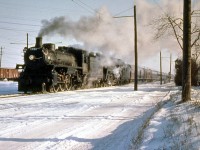 The last steam-powered run of Canadian Pacific train #21 the "Chicago Express" is seen crossing Dundas Street west of the station in Galt, Ontario in January 1954. CPR G5-class light Pacific 1221 and G3-class semi-streamlined Pacific 2409 head up the usual passenger consist. Due to a pending fireman's strike in January 1954, steam replaced normal diesels.
<br><br>
(Original photographer George Schaller, duplicate slide from the collection of Bill Thomson and posted on behalf of and with Mr. Schaller's full participation). 