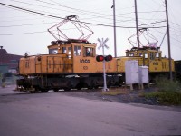It was tough to catch these electrics on the job. Not only did they really move, the roads did not go where they did, and a shot or two was best one could expect without being 'trapped' on private property. INCO 123 and 126, captured here heading westbound, were 85 Tonners, built 1942 and 1950 respectively; originally were Kennecott Copper 62 and 63. They were both retired and stored in Sudbury along with the rest of the electric fleet when the company 'upgraded' to diesel GP38s around 2001. I would have thought electric would have been cheaper to run, but these motors were getting rather on in years. Since this photo was taken, the company has changed from INCO to CVRD Inco, and now Vale Inco. I still prefer the old name, International Nickel.