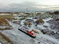 Easily one of the most somber photos I've taken, this one got to me a bit. CP 5583 came along with CP 6608 and 6612 (both ex SOO) to K&K Recycling a couple weeks prior on CN 546. Here, 5583 now sits gutted and alone on a cold quiet breezy afternoon. In less than a week, it will completely disappear into the pile behind where the scattered remains of 6608 and 6612 lay. Part of 24 unit order completed on 08/09/16, K&K was and still is taking in old CP EMD relics, particularly SD40-2's to be reduced to shards of metal.<br><br>CP 5583's story is an interesting one, in which it was built in 1972. It then wrecked in 1980, and was rebuilt five years later and continued strong until around 2013/14ish, making it one of the last 5500s on the active roster. Nonetheless, its fate became sealed when the oil boom came crashing down and E.H.H's cutthroat managing scared away a lot of customers. Frequent CP SD40-2 sightings as late as early 2014 became nonexistent by early 2016 except heading for scrap. Late 2016 saw a few SD40-2's return to service, however, this picture explains that their 50 year reign is pretty much over.<br><br>Like many scrap yards in Ontario, you won't be able to buy from them. I already tried, and couldn't even walk away with a numberboard. All your photogenic memories will have to be photos themselves unfortunately. Mind you, this location is not accessible by foot unless you want to get chased by the guard.