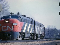 CN 6769, an FPA-4, built by MLW in 1959, heads up a westbound passenger train at Bayview Jct in May 1968.  
