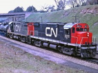 A pair of CN C-424's are coming off the Dundas Sub at Bayview Jct. in May 1968.  