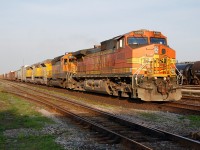 A CN freight with more foreign power rolls westbound at Sarnia with BNSF 4488 BNSF 6937 and two new Union Pacific SD70ACe's 8580 and 8574 from the GM plant at London. 