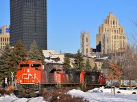 CN 8901, CN 8813 & IC 2714 lead CN 149 out of the Port of Montreal as they round a curve on a sunny but cold morning.