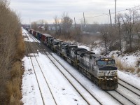 Five NS GE's (NS 9406, NS 8364, NS 9037, NS 8080 & NS 9139) it lead a much longer than usual (94 cars) CN 529 towards Taschereau Yard. If this seems like more power and cars than usual it's because this is two days worth of CN 529.