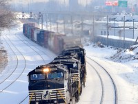 NS 9462, NS 6955 & an unknown GE lead a measly 102-axle long CN 529 through Montreal West.