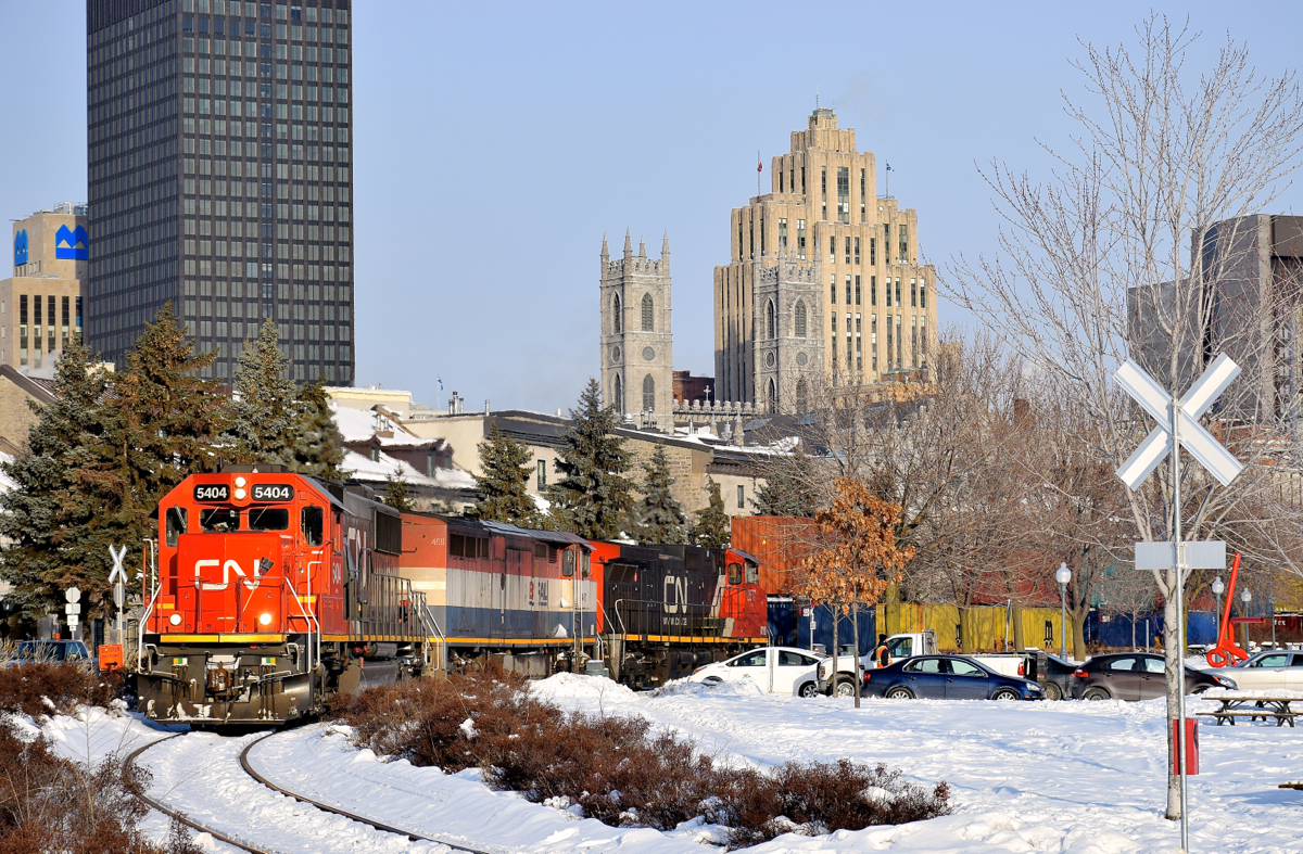 CN 149 is leaving the Port of Montreal with ex-Oakway SD60 CN 5404 leading on a truly frigid morning. Trailing is BCOL 4611 & CN 2677.