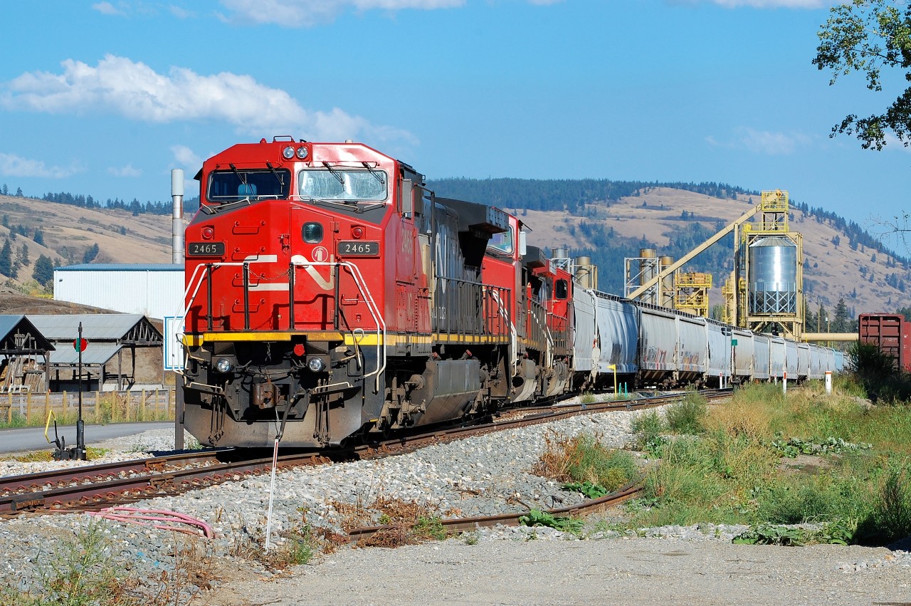 A new wood pellet plant became operational in Lavington during the fall of 2015. This view shows IC 2465 along with CN nos.2598&2542 picking up some cars and preparing for an early evening departure.