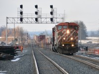 Not quite the mount(ain) it was built to climb, BCOL 4604 pulls a short CN Q148 up through Mount Pleasant at CN Norval