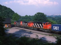 The longest day(light) of the year is upon me, and I elected to go up to Dundas and catch some of those after dinner westbounds that look so good passing the old station here. It turned out to be a quiet evening, and other than VIAs, I had to settle for an eastbound. The late sun is beautiful, the train, well, it would do. Three matched GP40-2L(W)9467, 9582 and 9596. These locos are gone from the CN roster now, but soldier on elsewhere,( as do an extreme number of these units)......on WAMX, Aberdeen, Carolina & Western, and Helm respectively.