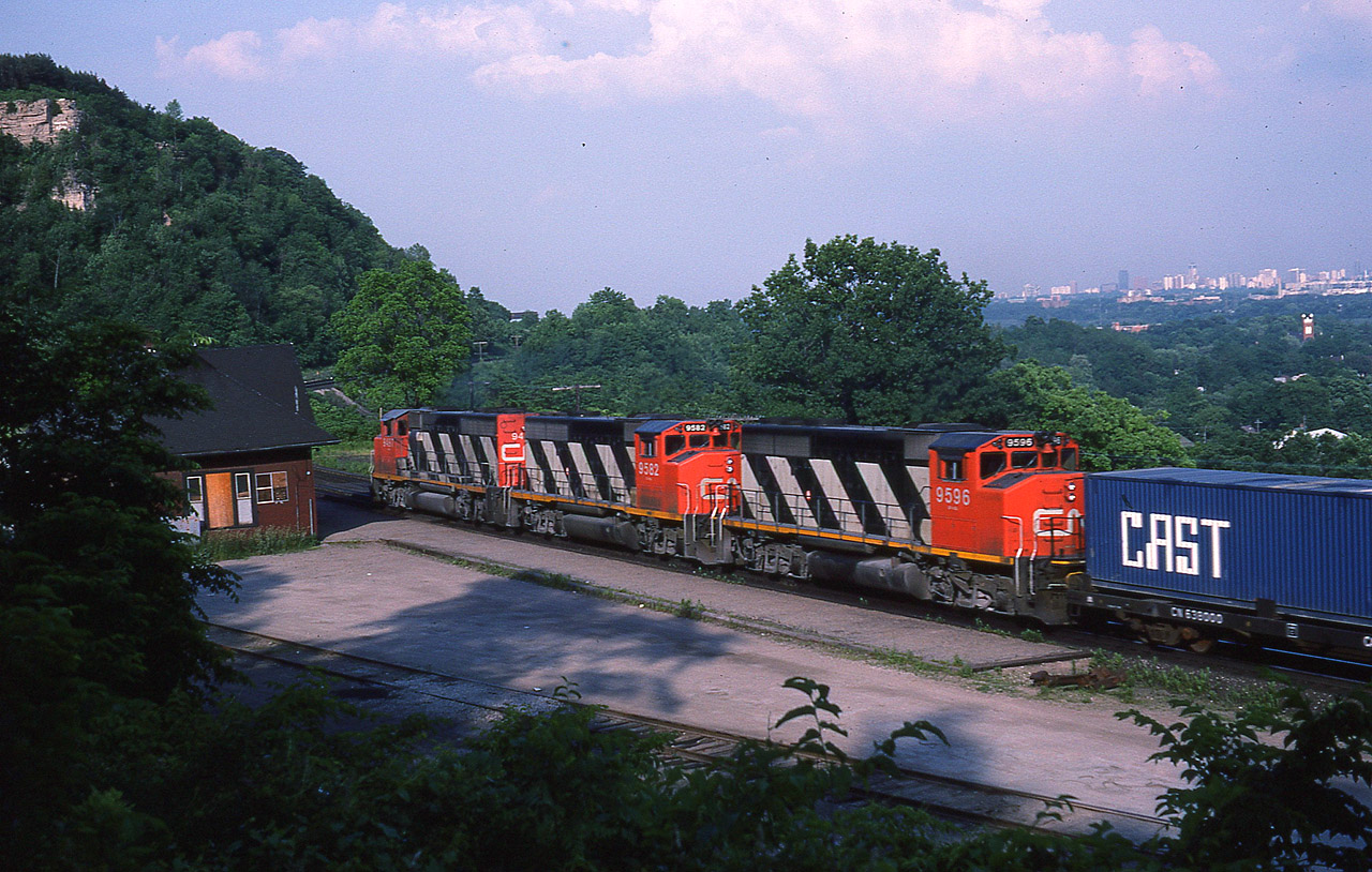 The longest day(light) of the year is upon me, and I elected to go up to Dundas and catch some of those after dinner westbounds that look so good passing the old station here. It turned out to be a quiet evening, and other than VIAs, I had to settle for an eastbound. The late sun is beautiful, the train, well, it would do. Three matched GP40-2L(W)9467, 9582 and 9596. These locos are gone from the CN roster now, but soldier on elsewhere,( as do an extreme number of these units)......on WAMX, Aberdeen, Carolina & Western, and Helm respectively.