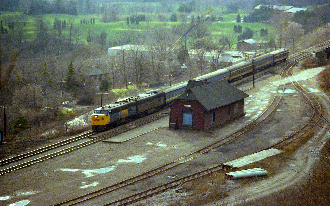 Here is an angle photographers seldom bothered with at the old Dundas station. But, it was worth a try. It is around the noon hour that VIA #72 eastward passes, so I hiked up into the hill and cleaned out some brush to wait for it. Standard train. Power 6781 and 6865. It was worth it. History recorded.