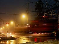 Light rain and fog fills the air in Milton as a CP westbound led by a SD40 "Red Barn" storms past the old cross bucks protecting Martin Street crossing in Milton. The old signals have seen the passage of countless trains over the decades but will soon be replaced by newer technology, including LED lighting. I've always liked night photography in the rain as it adds a nice glow to the landscape, and you can never go wrong with a bit of fog thrown in for good luck :)