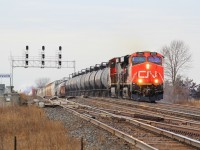 CN M376 works its way up and down the grades east of Belleville making good use of the mid DPU to keep them at good pace. 