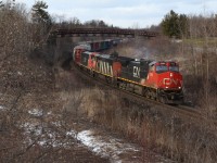All is quiet at the golf course, or at least it was until a trio of older GE's rolled through the dormant landscape. With newer GE Gevos dominating most trains these days, it's nice caching solid sets of older GE's making up a consist. This is a location I never get tired of visiting, and it's a nice place to go to clear ones head and take in the sounds of the country.