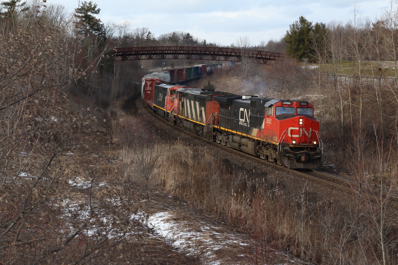 All is quiet at the golf course, or at least it was until a trio of older GE's rolled through the dormant landscape. With newer GE Gevos dominating most trains these days, it's nice caching solid sets of older GE's making up a consist. This is a location I never get tired of visiting, and it's a nice place to go to clear ones head and take in the sounds of the country.